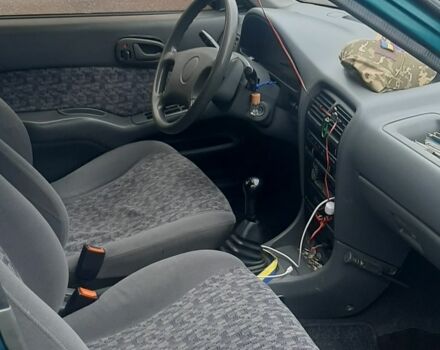 Зеленый Сузуки Свифт, объемом двигателя 1.3 л и пробегом 230 тыс. км за 1399 $, фото 5 на Automoto.ua