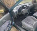 Зелений Сузукі Свифт, об'ємом двигуна 1.3 л та пробігом 200 тис. км за 1700 $, фото 4 на Automoto.ua