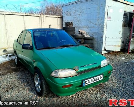 Зеленый Сузуки Свифт, объемом двигателя 1.3 л и пробегом 200 тыс. км за 650 $, фото 1 на Automoto.ua