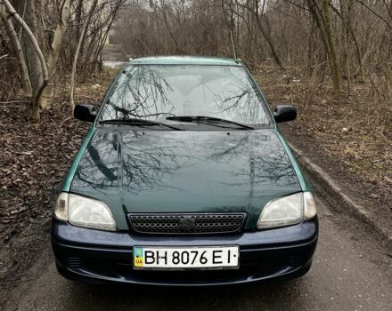 Зеленый Сузуки Свифт, объемом двигателя 1.3 л и пробегом 80 тыс. км за 600 $, фото 1 на Automoto.ua