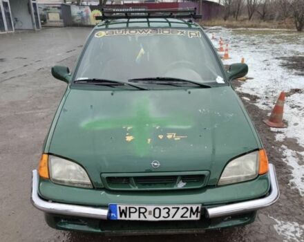 Зеленый Сузуки Свифт, объемом двигателя 1.3 л и пробегом 190 тыс. км за 700 $, фото 1 на Automoto.ua