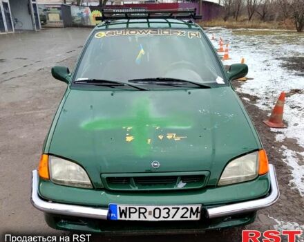 Зеленый Сузуки Свифт, объемом двигателя 1.4 л и пробегом 190 тыс. км за 700 $, фото 1 на Automoto.ua