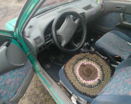 Зеленый Сузуки Свифт, объемом двигателя 1.3 л и пробегом 202 тыс. км за 900 $, фото 1 на Automoto.ua