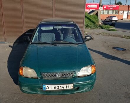 Зеленый Сузуки Свифт, объемом двигателя 1.3 л и пробегом 260 тыс. км за 500 $, фото 1 на Automoto.ua