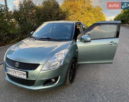 Зелений Сузукі Свифт, об'ємом двигуна 1.24 л та пробігом 136 тис. км за 7700 $, фото 1 на Automoto.ua