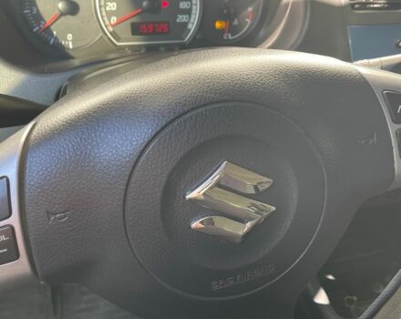 Помаранчевий Сузукі Свифт, об'ємом двигуна 1.3 л та пробігом 159 тис. км за 4500 $, фото 6 на Automoto.ua