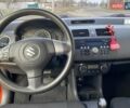 Оранжевый Сузуки Свифт, объемом двигателя 1.33 л и пробегом 175 тыс. км за 5800 $, фото 4 на Automoto.ua