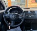 Помаранчевий Сузукі Свифт, об'ємом двигуна 1.33 л та пробігом 188 тис. км за 5500 $, фото 13 на Automoto.ua