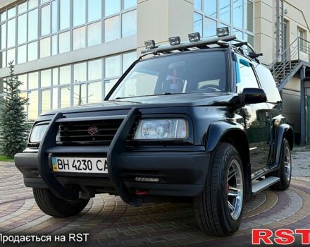 Черный Сузуки Витара, объемом двигателя 1.6 л и пробегом 185 тыс. км за 3500 $, фото 2 на Automoto.ua