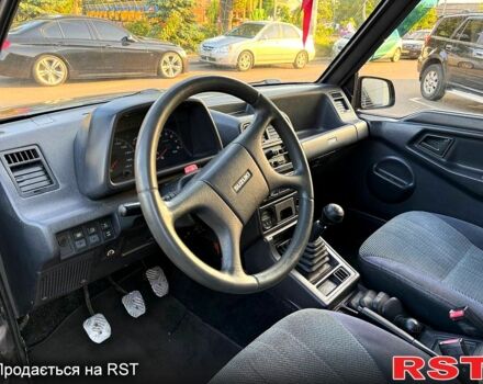 Черный Сузуки Витара, объемом двигателя 1.6 л и пробегом 185 тыс. км за 3500 $, фото 6 на Automoto.ua