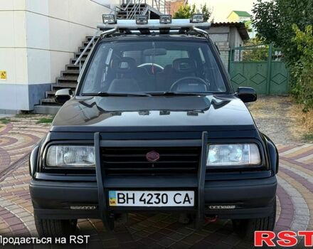 Черный Сузуки Витара, объемом двигателя 1.6 л и пробегом 185 тыс. км за 3500 $, фото 1 на Automoto.ua