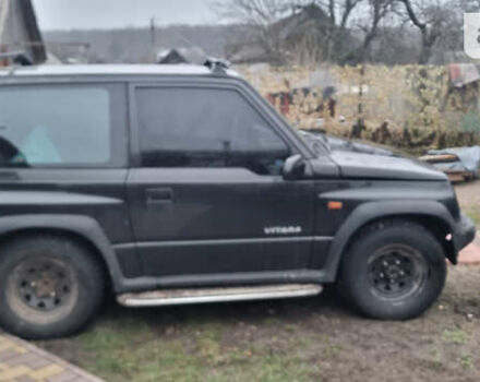 Черный Сузуки Витара, объемом двигателя 1.59 л и пробегом 303 тыс. км за 4950 $, фото 14 на Automoto.ua