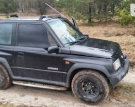 Черный Сузуки Витара, объемом двигателя 1.59 л и пробегом 303 тыс. км за 4950 $, фото 4 на Automoto.ua