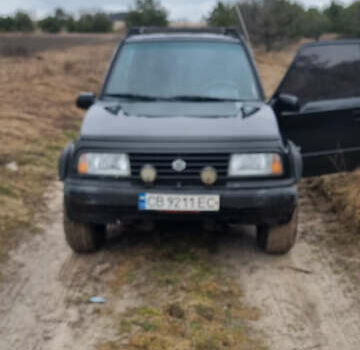 Черный Сузуки Витара, объемом двигателя 1.59 л и пробегом 303 тыс. км за 4950 $, фото 2 на Automoto.ua