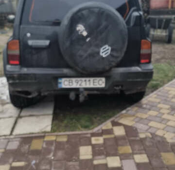 Черный Сузуки Витара, объемом двигателя 1.59 л и пробегом 303 тыс. км за 4950 $, фото 15 на Automoto.ua