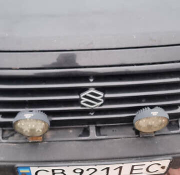 Черный Сузуки Витара, объемом двигателя 1.59 л и пробегом 303 тыс. км за 4950 $, фото 10 на Automoto.ua