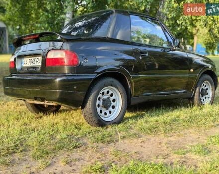 Черный Сузуки Витара, объемом двигателя 1.6 л и пробегом 185 тыс. км за 5500 $, фото 25 на Automoto.ua