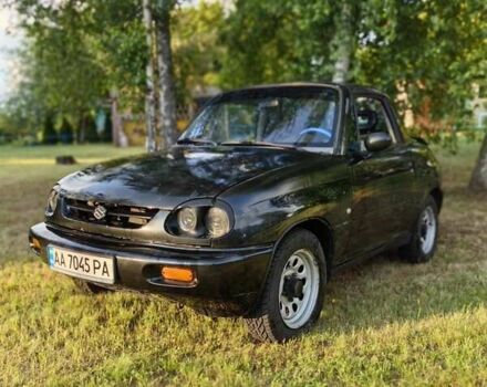 Черный Сузуки Витара, объемом двигателя 1.6 л и пробегом 185 тыс. км за 5500 $, фото 23 на Automoto.ua