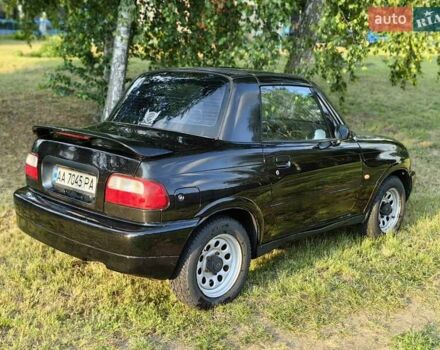 Черный Сузуки Витара, объемом двигателя 1.6 л и пробегом 185 тыс. км за 5500 $, фото 29 на Automoto.ua