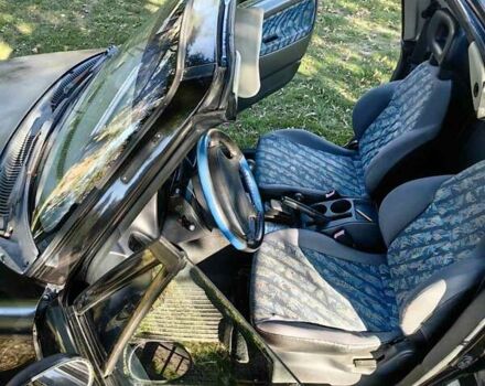 Черный Сузуки Витара, объемом двигателя 1.6 л и пробегом 185 тыс. км за 5500 $, фото 4 на Automoto.ua