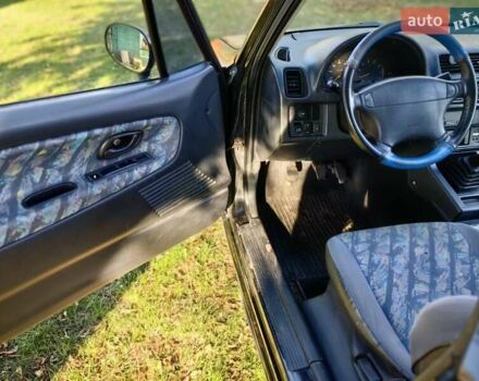 Черный Сузуки Витара, объемом двигателя 1.6 л и пробегом 185 тыс. км за 5500 $, фото 10 на Automoto.ua