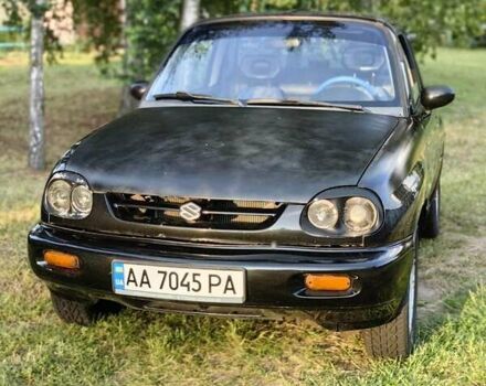 Черный Сузуки Витара, объемом двигателя 1.6 л и пробегом 185 тыс. км за 5500 $, фото 33 на Automoto.ua