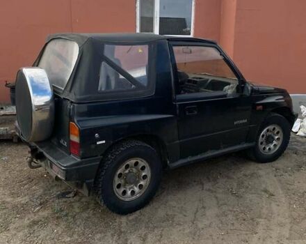 Черный Сузуки Витара, объемом двигателя 1.6 л и пробегом 300 тыс. км за 3000 $, фото 1 на Automoto.ua