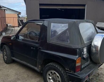 Черный Сузуки Витара, объемом двигателя 1.6 л и пробегом 300 тыс. км за 3000 $, фото 2 на Automoto.ua