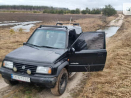 Черный Сузуки Витара, объемом двигателя 1.59 л и пробегом 303 тыс. км за 4950 $, фото 1 на Automoto.ua