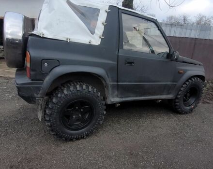 Чорний Сузукі Вітара, об'ємом двигуна 2 л та пробігом 186 тис. км за 3600 $, фото 1 на Automoto.ua