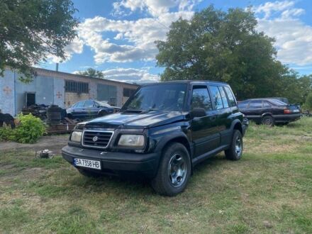 Черный Сузуки Витара, объемом двигателя 1.9 л и пробегом 200 тыс. км за 4250 $, фото 1 на Automoto.ua