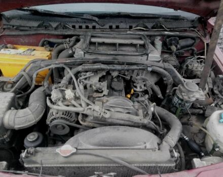 Красный Сузуки Витара, объемом двигателя 2 л и пробегом 350 тыс. км за 4500 $, фото 3 на Automoto.ua