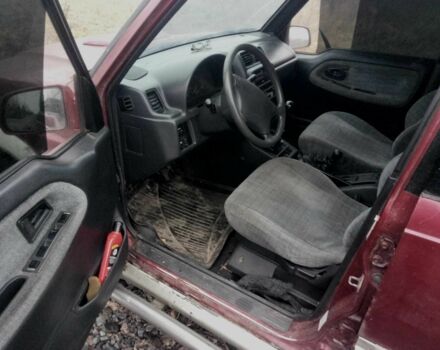 Красный Сузуки Витара, объемом двигателя 2 л и пробегом 350 тыс. км за 4500 $, фото 1 на Automoto.ua