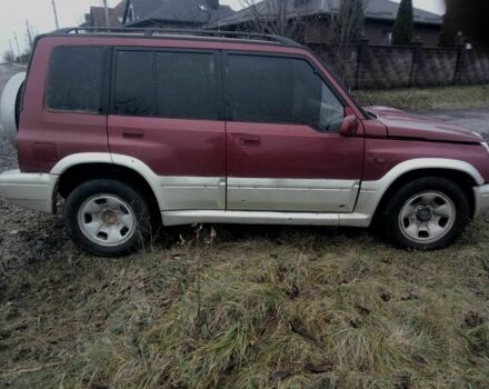 Красный Сузуки Витара, объемом двигателя 2 л и пробегом 350 тыс. км за 4500 $, фото 5 на Automoto.ua