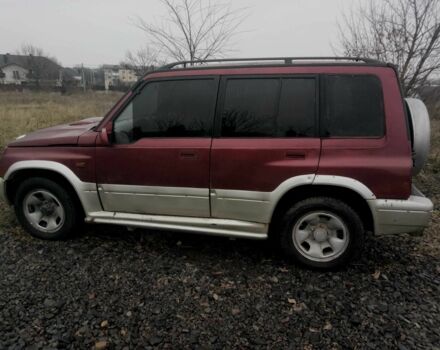 Красный Сузуки Витара, объемом двигателя 2 л и пробегом 350 тыс. км за 4500 $, фото 4 на Automoto.ua