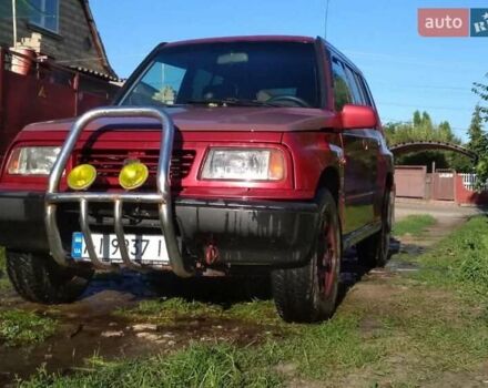 Красный Сузуки Витара, объемом двигателя 1.6 л и пробегом 300 тыс. км за 4400 $, фото 1 на Automoto.ua