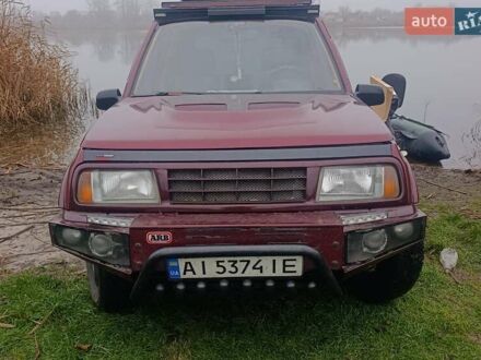 Червоний Сузукі Вітара, об'ємом двигуна 1.6 л та пробігом 860 тис. км за 3500 $, фото 1 на Automoto.ua