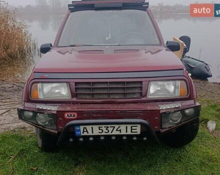 Червоний Сузукі Вітара, об'ємом двигуна 1.6 л та пробігом 860 тис. км за 3500 $, фото 1 на Automoto.ua