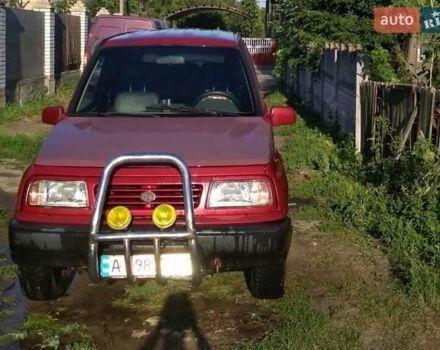 Червоний Сузукі Вітара, об'ємом двигуна 1.6 л та пробігом 300 тис. км за 4400 $, фото 1 на Automoto.ua
