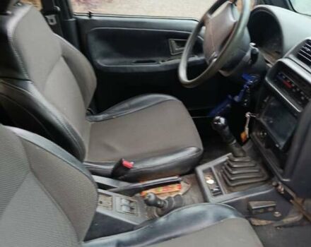 Синий Сузуки Витара, объемом двигателя 1.59 л и пробегом 390 тыс. км за 3200 $, фото 1 на Automoto.ua