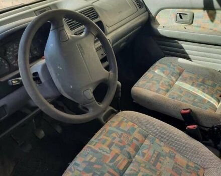 Красный Сузуки Вагон Р, объемом двигателя 1.2 л и пробегом 200 тыс. км за 750 $, фото 5 на Automoto.ua