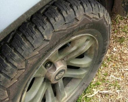 Серый Сузуки ХЛ7, объемом двигателя 2 л и пробегом 280 тыс. км за 5653 $, фото 2 на Automoto.ua