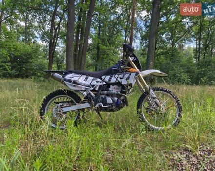 Белый Сузуки DR-Z 400SM, объемом двигателя 0.4 л и пробегом 12 тыс. км за 6400 $, фото 7 на Automoto.ua