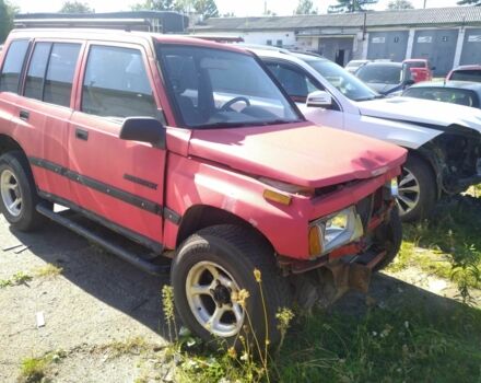 Красный Сузуки Sidekick, объемом двигателя 1.6 л и пробегом 284 тыс. км за 2000 $, фото 2 на Automoto.ua