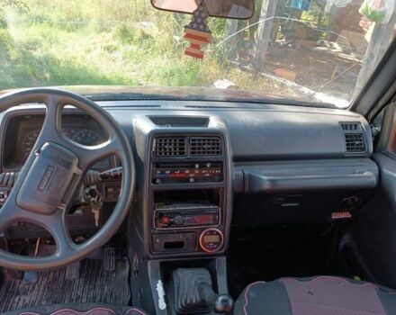 Червоний Сузукі Sidekick, об'ємом двигуна 1.6 л та пробігом 300 тис. км за 3000 $, фото 4 на Automoto.ua