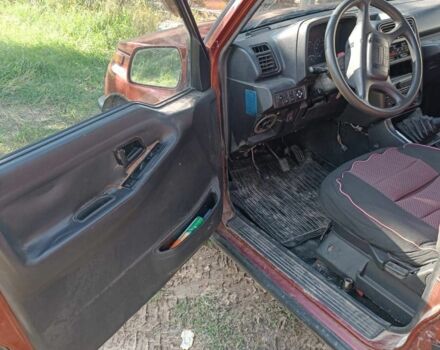 Червоний Сузукі Sidekick, об'ємом двигуна 1.6 л та пробігом 300 тис. км за 3000 $, фото 5 на Automoto.ua