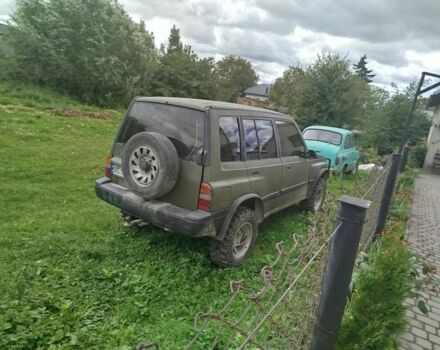 Зелений Сузукі Sidekick, об'ємом двигуна 1.6 л та пробігом 154 тис. км за 4100 $, фото 5 на Automoto.ua