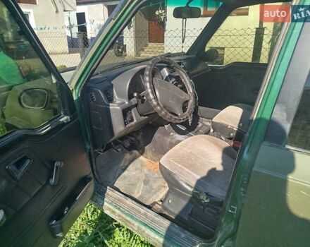 Зеленый Сузуки Sidekick, объемом двигателя 1.59 л и пробегом 154 тыс. км за 4100 $, фото 6 на Automoto.ua
