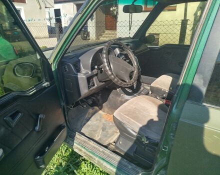 Зелений Сузукі Sidekick, об'ємом двигуна 1.6 л та пробігом 154 тис. км за 4100 $, фото 4 на Automoto.ua