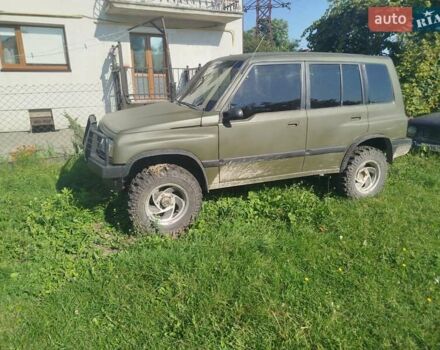 Зеленый Сузуки Sidekick, объемом двигателя 1.59 л и пробегом 154 тыс. км за 4100 $, фото 5 на Automoto.ua